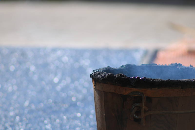 Cubo de asfalto fundido